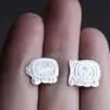 Aretes tipo botón con dos fechas diferentes del calendario Tzolkin
