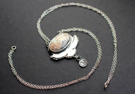 Unfold your wings necklace with a eagle, representing freedom, clear vision, and celestial power among the Celts
