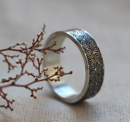 Triskel ring inspired by the Celtic motif