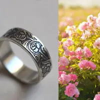 Rosa, flores y anillo