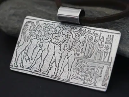 Collar del sello-cilindro del Rey de Kis que muestra una aventura del rey-héroe Gilgamesh.