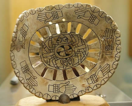 Native American shell pendant from Spiro Mounds.
