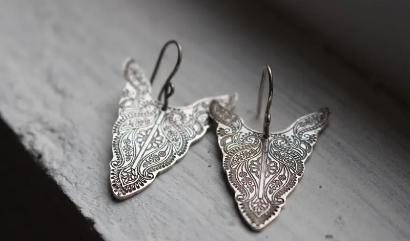 Abundancias, aretes tótem de bisonte en plata