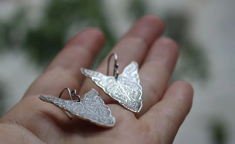 Abundancias, aretes tótem de bisonte en plata