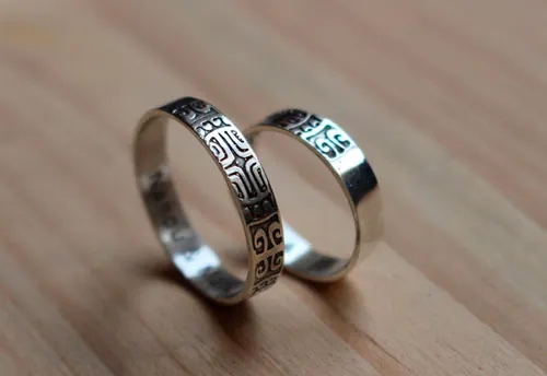 Alianzas diapasón, anillo símbolo polinesio en plata