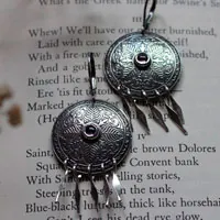Alissandre, aretes hojas en plata y zircón