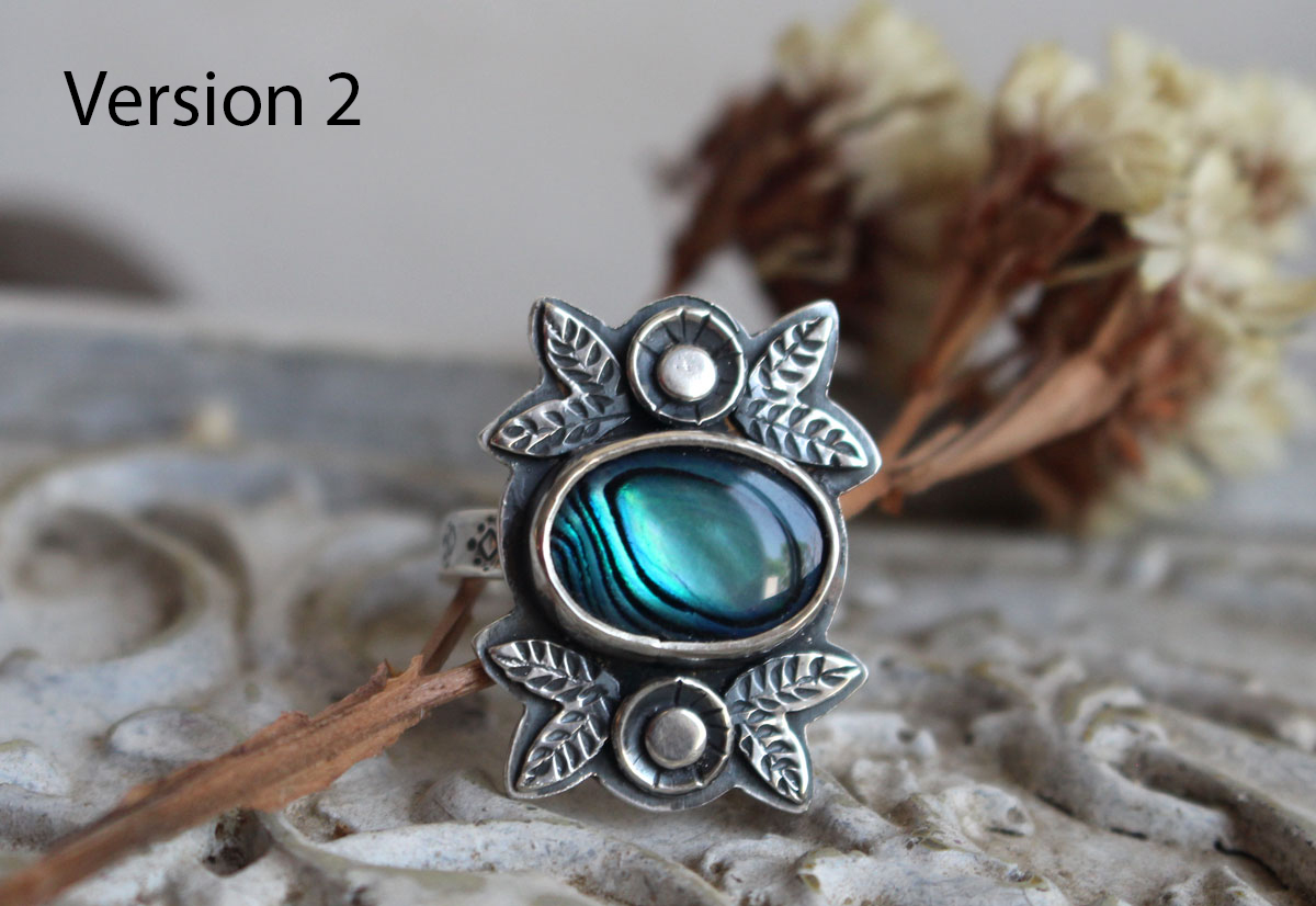 Azul de los mares, anillo de flor y concha en plata y paua