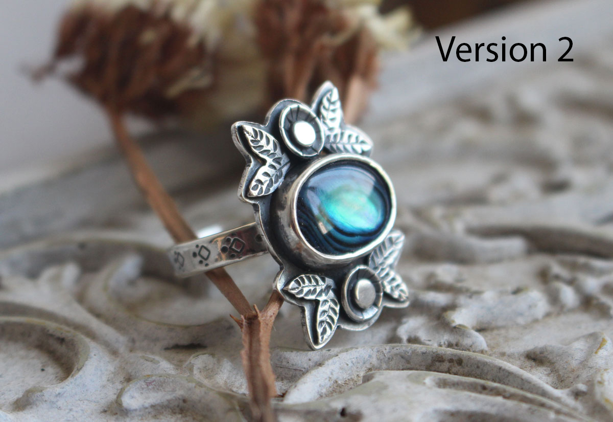 Azul de los mares, anillo de flor y concha en plata y paua