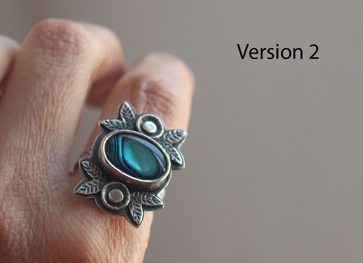 Azul de los mares, anillo de flor y concha en plata y paua