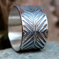 Boomerang, anillo chevrón y flecha en plata