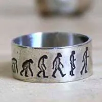 Darwin, anillo teoría de la evolución en plata