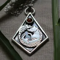 Dejarse guiar, collar zorro en plata y ámbar