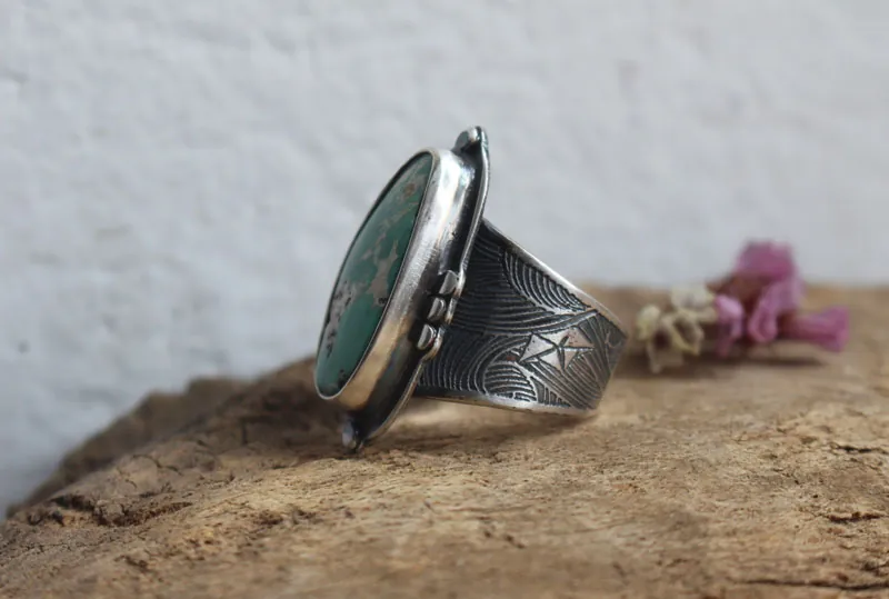 Dejarse llevar, anillo barco de origami en plata y turquesa de Nevada