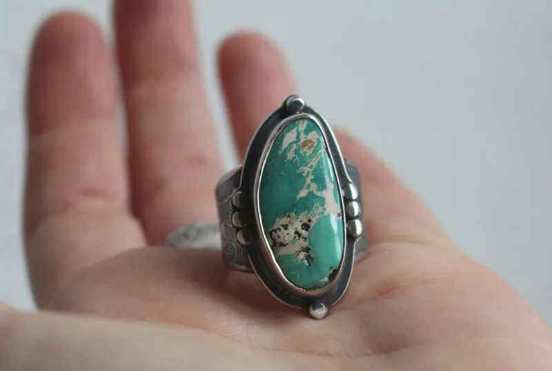 Dejarse llevar, anillo barco de origami en plata y turquesa de Nevada