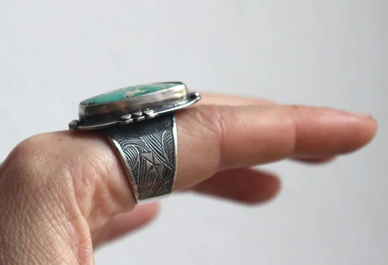Dejarse llevar, anillo barco de origami en plata y turquesa de Nevada