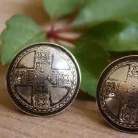 Dunisia, gemelos escudo celta en plata