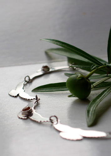 El canto del sol, collar aves en plata y zircón amarillo