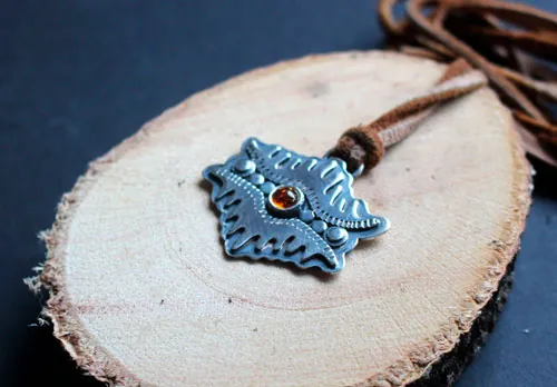 El ojo de la tierra, collar montaña tribal en plata y ámbar