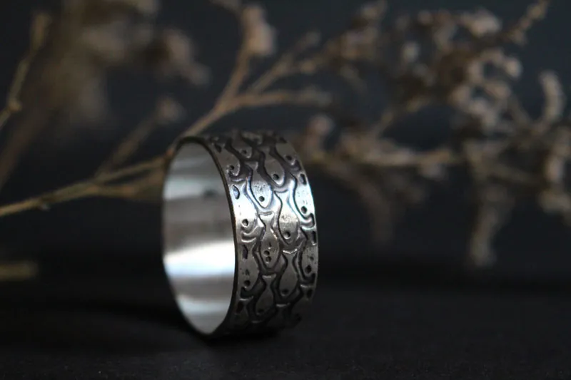 En armonía, anillo de peces en plata