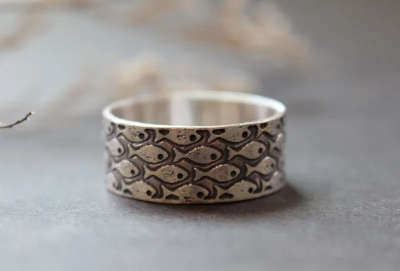 En armonía, anillo de peces en plata