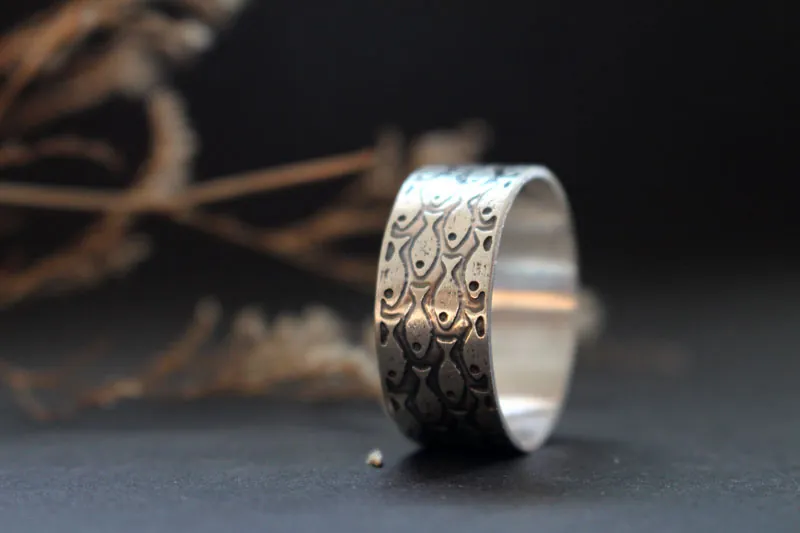En armonía, anillo de peces en plata