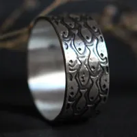 En armonía, anillo de peces en plata
