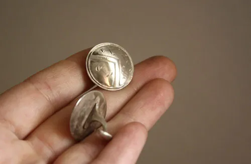 Escudo espartano, gemelos hoplitas griegos de Esparta en plata
