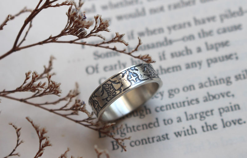 Esperanza y paz, anillo con paloma, estrella y rama de olivo en plata