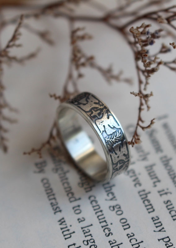 Esperanza y paz, anillo con paloma, estrella y rama de olivo en plata
