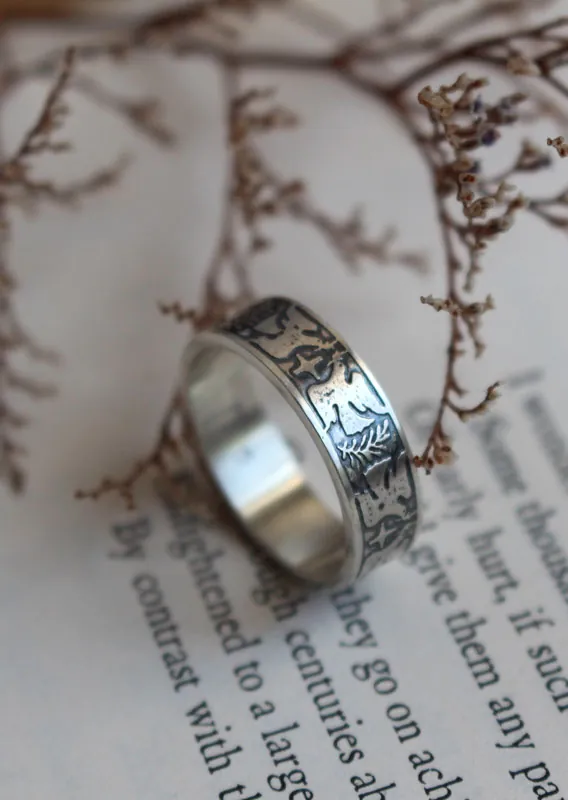 Esperanza y paz, anillo con paloma, estrella y rama de olivo en plata