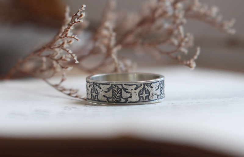 Esperanza y paz, anillo con paloma, estrella y rama de olivo en plata