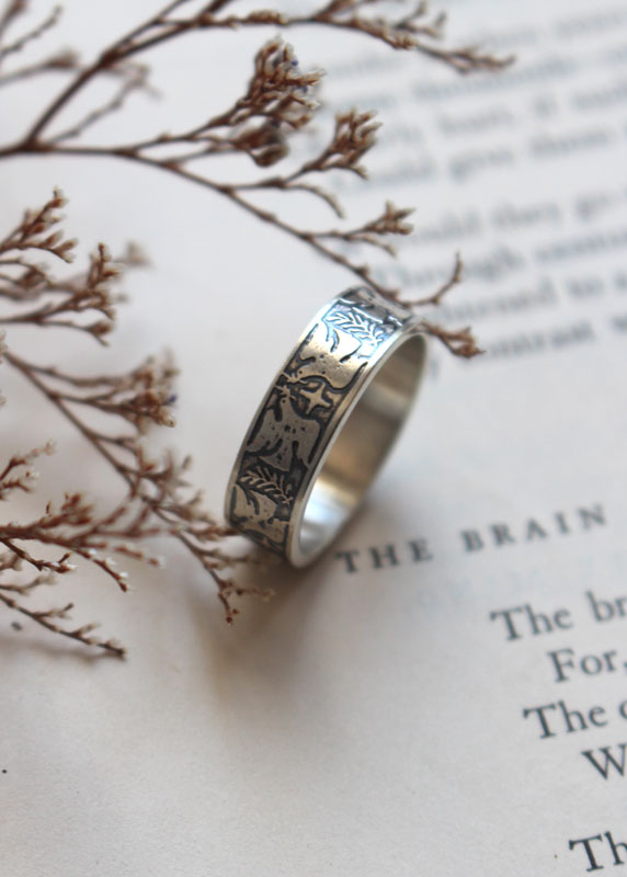 Esperanza y paz, anillo con paloma, estrella y rama de olivo en plata