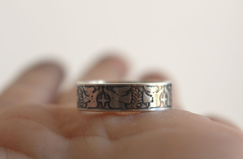 Esperanza y paz, anillo con paloma, estrella y rama de olivo en plata