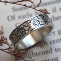 Esperanza y paz, anillo con paloma, estrella y rama de olivo en plata