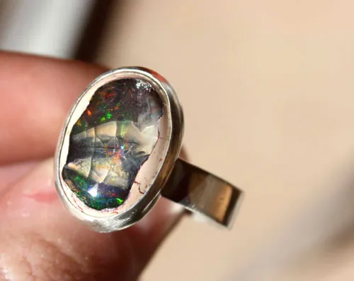 Estrella, anillo cielo nocturno en plata y ópalo de fuego