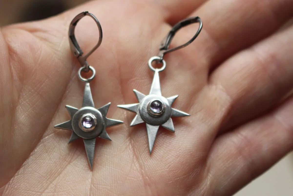 Estrella solitaria, aretes guía nocturna en plata y zircón