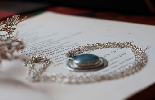 Eye of the sea, marine life necklace in silver and aquamarine