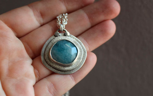 Eye of the sea, marine life necklace in silver and aquamarine