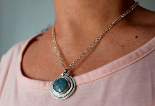 Eye of the sea, marine life necklace in silver and aquamarine