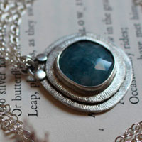 Eye of the sea, marine life necklace in silver and aquamarine