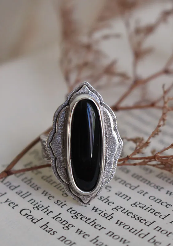 Flor del viento, anillo nube en plata y ónix