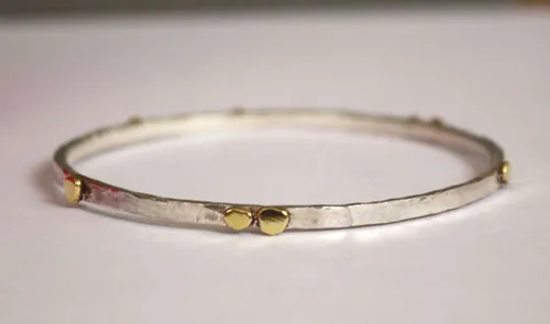 Helios, pulsera sol griego en plata, cobre y latón