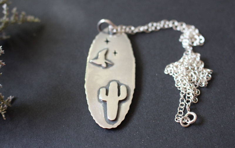 Howling at the moon, desert coyote necklace in sterling silver