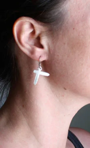 Indochine, aretes cruz Paradize del grupo de rock en plata