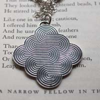 La danza del viento, collar con volutas aéreas en plata