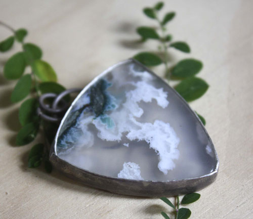 Land of ice, ice floe landscape pendant in silver and moss agate