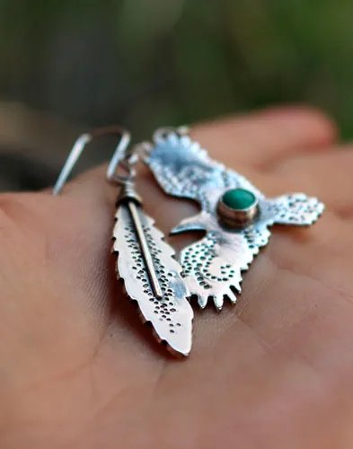 Libertad, aretes águila y pluma en plata y turquesa