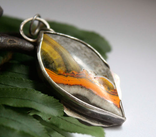 Liekki, Sami fire pendant in silver and bumblebee jasper