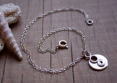 Lina, tobillera y pulsera espiral y círculo del infinito en plata