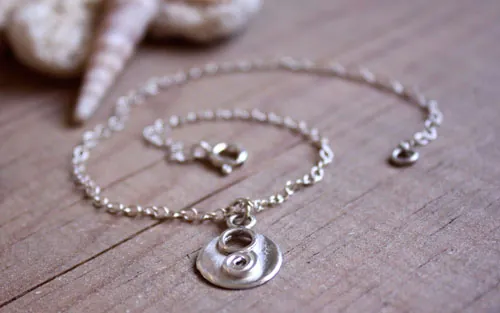 Lina, tobillera y pulsera espiral y círculo del infinito en plata